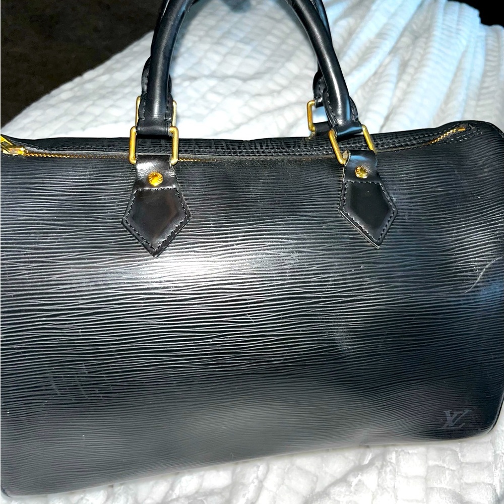 Louis Vuitton Black Epi Speedy 30
 Size: 13" L × 9.5" H